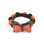 Load image into Gallery viewer, Halloween pet collar with orange and black fur balls and a spider web bow for dogs and cats