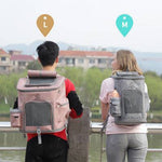 Load image into Gallery viewer, Two people wearing transparent cat backpack carriers with ventilation and bubble windows outdoors by a river