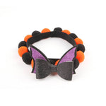 Load image into Gallery viewer, Halloween pet collar with orange and black fur balls and a purple glittery bat wing bow for dogs and cats