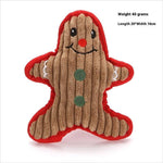 Load image into Gallery viewer, Tear-resistant plush gingerbread man Christmas toy for cats and dogs with built-in squeaker, 20cm by 16cm.