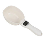 Load image into Gallery viewer, White digital pet food weighing spoon with electronic scale display for precise measurement of cat and dog food.