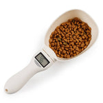 Load image into Gallery viewer, Digital pet food measuring spoon with electronic scale showing weight of cat and dog kibble in white scoop