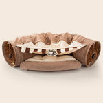 Load image into Gallery viewer, Collapsible cat tunnel with soft cushion, durable fabric, and interactive toys for playful and cozy pet entertainment.