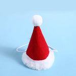 Load image into Gallery viewer, Red Santa Claus hat with white fur trim and pompom for small and medium pets holiday accessories