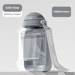 Load image into Gallery viewer, Gray 2-in-1 dog water bottle with integrated bowl and carry strap, large 1000ml capacity portable pet dispenser.