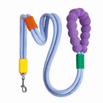 Load image into Gallery viewer, Heavy-duty dog leash with soft foam purple handle and strong light blue traction rope with colored accents and metal clip