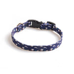 Load image into Gallery viewer, Adjustable pet collar with ghost pattern on dark blue background, featuring a black plastic buckle and metal ring for leash attachment