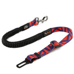 Load image into Gallery viewer, Adjustable red and blue pet seat belt with car buckle clip and shock-absorbing strap for secure dog and cat travel safety