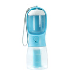 Load image into Gallery viewer, Blue 3-in-1 portable dog water bottle with feeder, waste bag dispenser, and bowl for travel use