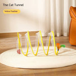 Load image into Gallery viewer, Folded S-shaped cat tunnel toy with yellow feather and mouse, collapsible for indoor and outdoor cat play.
