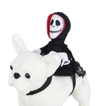 Load image into Gallery viewer, Skeleton rider Halloween Teddy Cape Costume on a white plush dog. Funny and breathable pet outfit for festive celebrations.