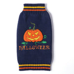 Load image into Gallery viewer, Navy blue knitted dog sweater with orange pumpkin and Halloween text, cozy acrylic pet outfit for fall and Halloween.