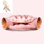 Load image into Gallery viewer, Pink collapsible cat tunnel with soft washable fabric and cushioned interior for interactive pet play and comfort