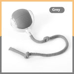 Load image into Gallery viewer, Grey interactive cat toy ball with attached string for feline play and exercise on a white background