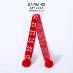 Load image into Gallery viewer, Red knitted Christmas scarf for small dogs and cats with snowflake pattern and pom-poms on each end