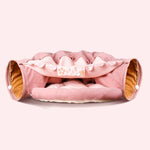 Load image into Gallery viewer, Pink collapsible cat tunnel with soft cushioned interior and washable fabric for interactive pet play and comfort