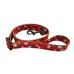 Load image into Gallery viewer, Red Christmas dog leash with festive Santa and snowman pattern, adjustable polyester with metal clip for holiday walks.