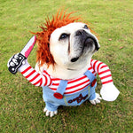 Load image into Gallery viewer, Bulldog wearing an adjustable Halloween costume with red striped shirt, overalls, fake arms, and a toy knife prop on grass.