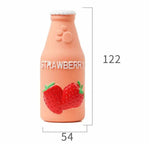 Load image into Gallery viewer, Strawberry-flavored latex dog toy shaped like a bottle, chew-resistant and designed to float, boredom buster for dogs.