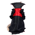 Load image into Gallery viewer, Small dog wearing a black and red vampire cape costume for Halloween or cosplay events