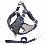 Load image into Gallery viewer, Adjustable grey and navy mesh pet harness with reflective straps and matching leash designed for comfort and safety during walks