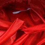 Load image into Gallery viewer, Close-up of shiny red satin fabric from a cute Halloween pet vampire cloak costume for pets.