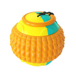 Load image into Gallery viewer, Colorful dog chew ball with textured surface and attached draw rope for training and teeth cleaning functions