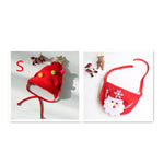 Load image into Gallery viewer, Red Christmas pet hat with pom-poms and adjustable red saliva towel bib with Santa and snowflake design