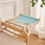 Load image into Gallery viewer, Space-saving cat hanging bed with blue and gray fabric, designed for window, balcony, or bedside use as a cozy cat perch.