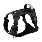 Load image into Gallery viewer, Black no-pull dog harness with reflective trim and GPS tag holder, built for durability and nighttime safety.
