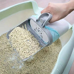 Load image into Gallery viewer, Cat Litter Poop Picker scooping clean litter, demonstrating wide shovel head and integrated bin for quick and tidy cleanup.