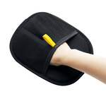 Load image into Gallery viewer, Black pet hair remover glove with breathable mesh and yellow handle strap for grooming cats and dogs.