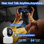 Load image into Gallery viewer, Person using smartphone to communicate through WiFi pet camera with night vision and two-way audio features.