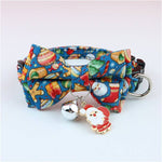 Load image into Gallery viewer, Adjustable blue Christmas pet collar with festive bow tie, silver bell, and Santa Claus charm for dogs and cats
