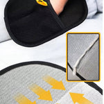 Load image into Gallery viewer, Black pet hair remover glove shown with captured dog or cat hair on fabric to demonstrate grooming tool effectiveness.