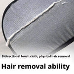 Load image into Gallery viewer, Close-up of pet hair remover glove showing bidirectional brush cloth with collected pet hair on gray fabric surface