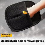 Load image into Gallery viewer, Black electrostatic pet hair remover glove worn on hand, removing cat and dog hair from surface effectively