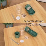 Load image into Gallery viewer, Disassembled green Portable Pet Travel Feeder showing easy-to-clean parts, ideal for hygienic pet feeding.