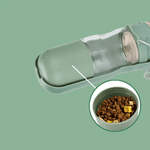 Load image into Gallery viewer, Green 2-in-1 Pet Travel Feeder laid flat with visible food compartment, ideal for feeding pets on the go.