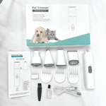 Load image into Gallery viewer, 4-in-1 electric pet clipper grooming kit with trimmer, combs, nail grinder, cleaning brush, and USB charger for dogs and cats