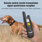 Load image into Gallery viewer, Hand holding a black remote dog training collar with a dog wearing the collar in a field, showcasing 500m remote control range and fast pairing.