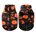 Load image into Gallery viewer, Black and orange waterproof dog jacket with pumpkin and paw print design for small and medium pets, warm and windproof Halloween coat.