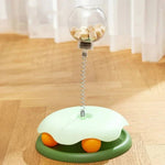 Load image into Gallery viewer, Green Interactive Cat Toy & Feeder Set with orange balls and treat-filled globe, designed for interactive feeding and play.