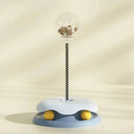 Load image into Gallery viewer, Blue Interactive Cat Toy & Feeder Set with white top and yellow balls, designed for slow feeding and interactive play.