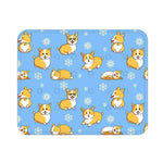 Load image into Gallery viewer, Blue cooling dog mat with cartoon corgi dogs and snowflakes pattern for summer pet comfort.