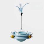 Load image into Gallery viewer, Blue turntable cat toy with feather and balls designed for interactive dental play and entertainment