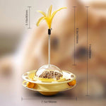 Load image into Gallery viewer, Yellow turntable cat toy with feather and ball rollers, measuring 7.1in by 11in for interactive play and dental care