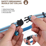Load image into Gallery viewer, Close-up of a blue reflective cat collar with safety breakaway buckle and removable bell being held in hands