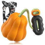 Load image into Gallery viewer, Indestructible pumpkin-shaped dog chew toy with rope and handle for fetch and tug games with medium and large dogs.