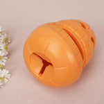 Load image into Gallery viewer, Orange indestructible pumpkin-shaped chew toy designed for aggressive chewers and puppies.